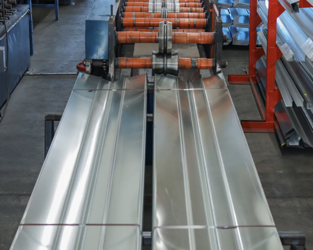 A conveyor belt with orange and white lines on it.