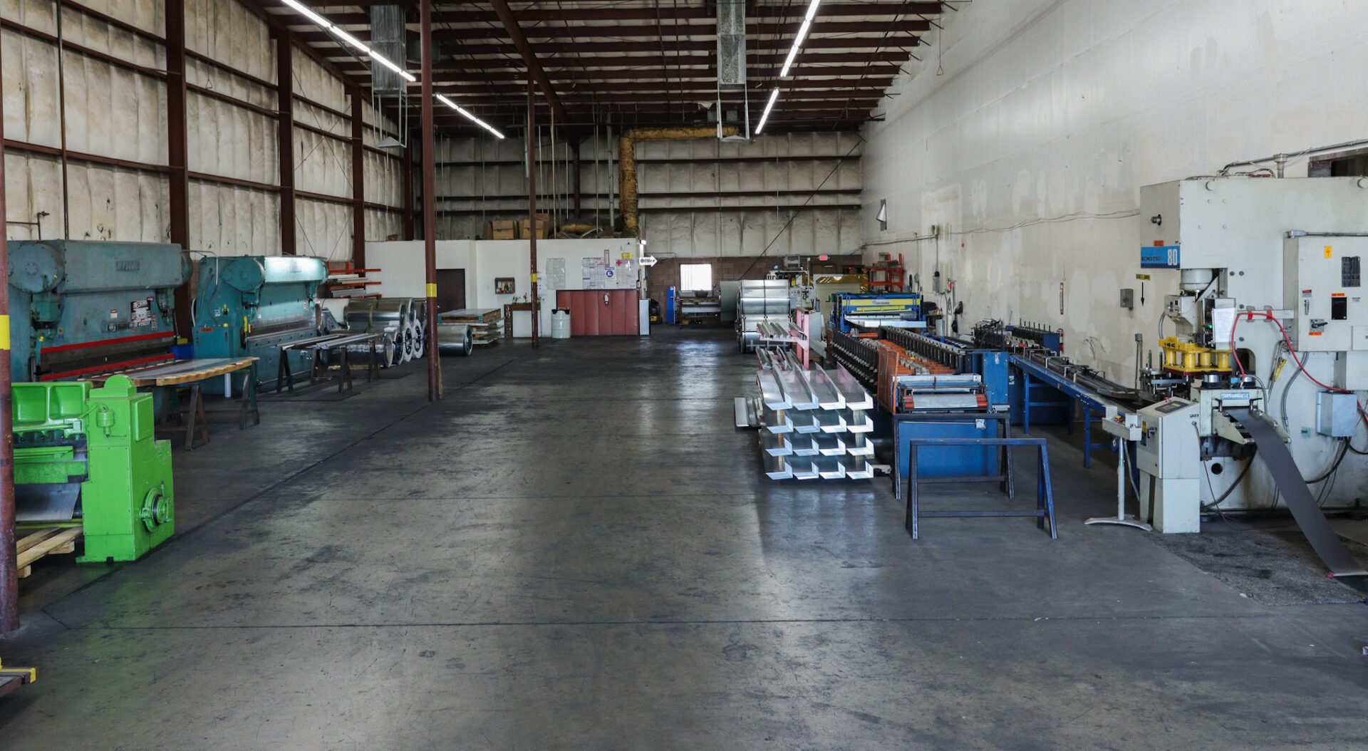 A warehouse filled with lots of metal boxes.